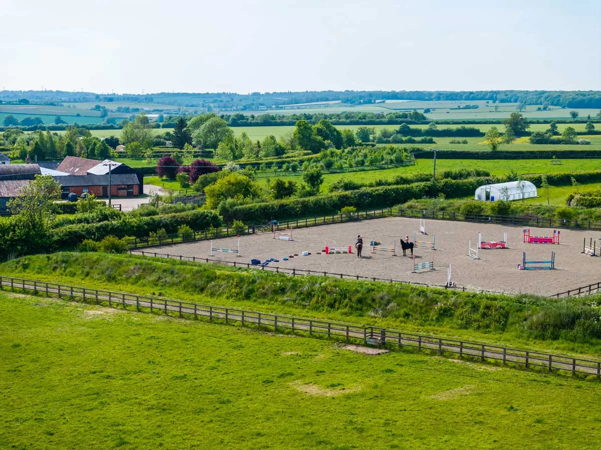 Horse Riding in Suffolk equestrian manege freedom farm showjumping